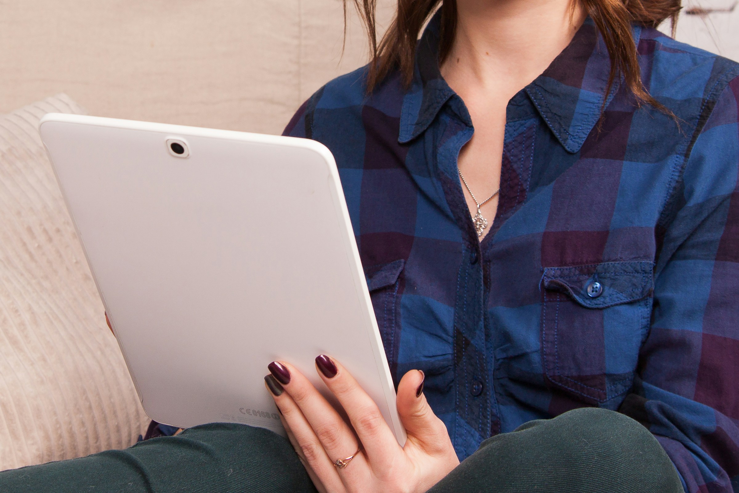 woman reading her emails - Email Deliverability Issues