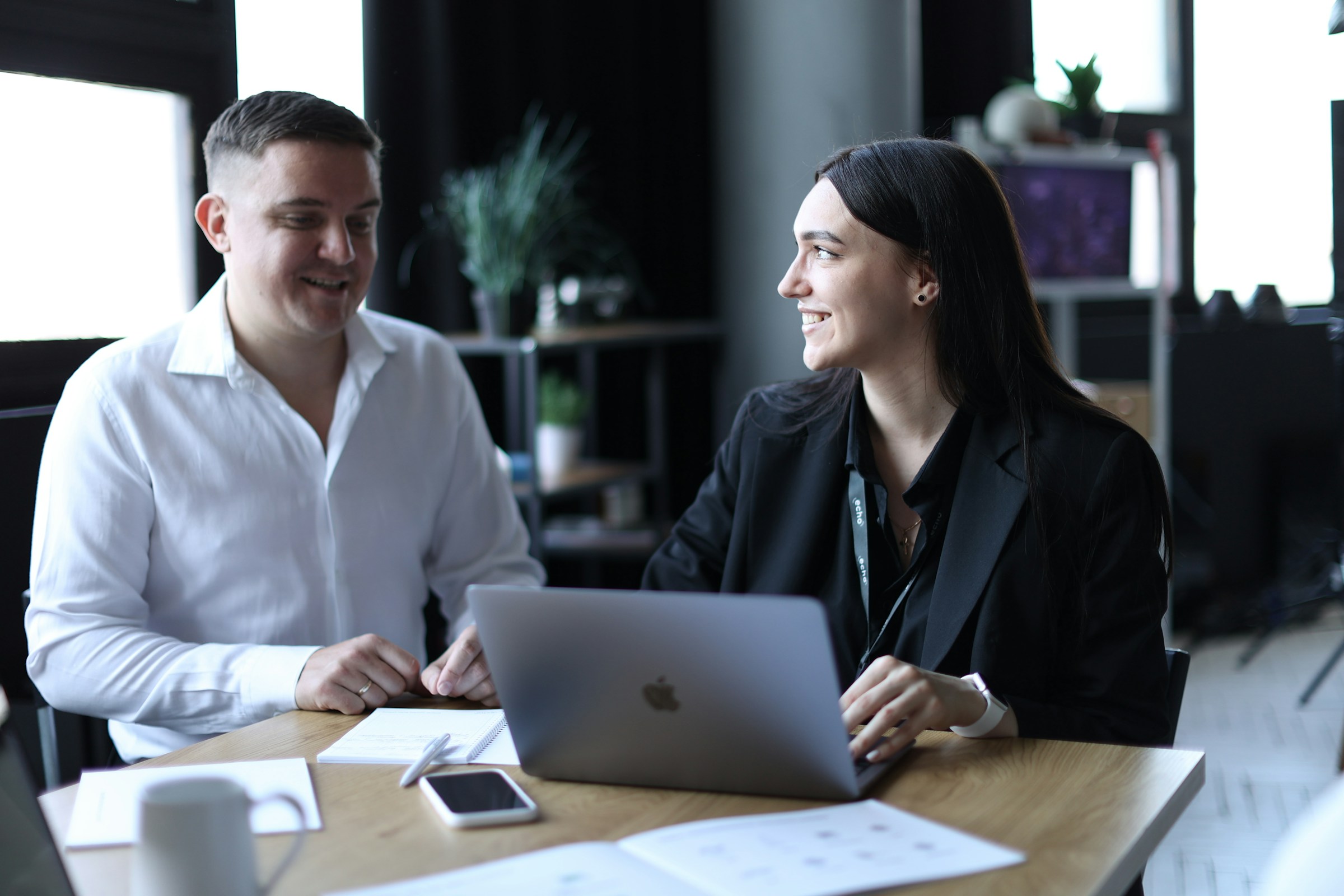 person with a team mate - Professional Email Example 