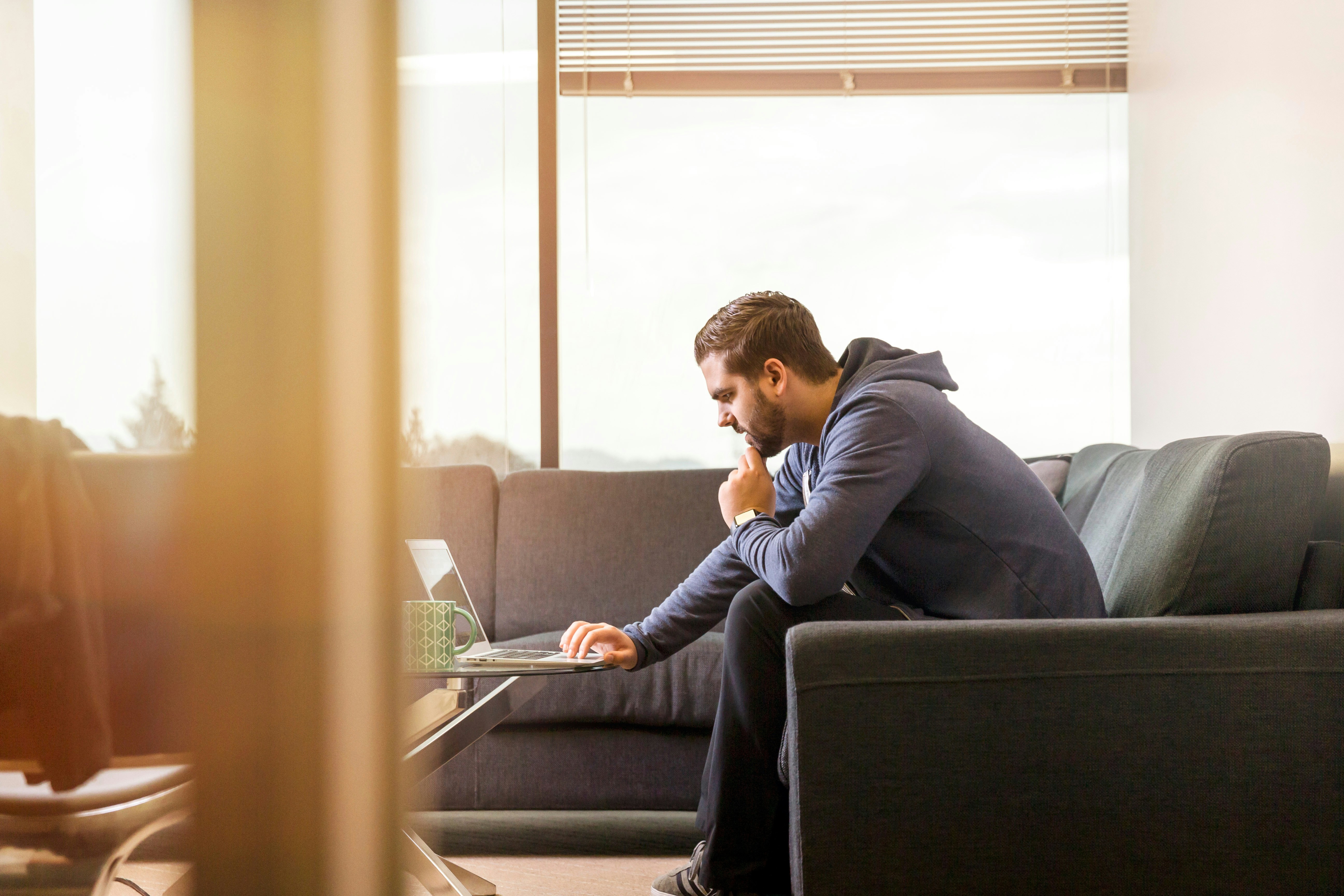 man working on laptop - IP Address Reputation