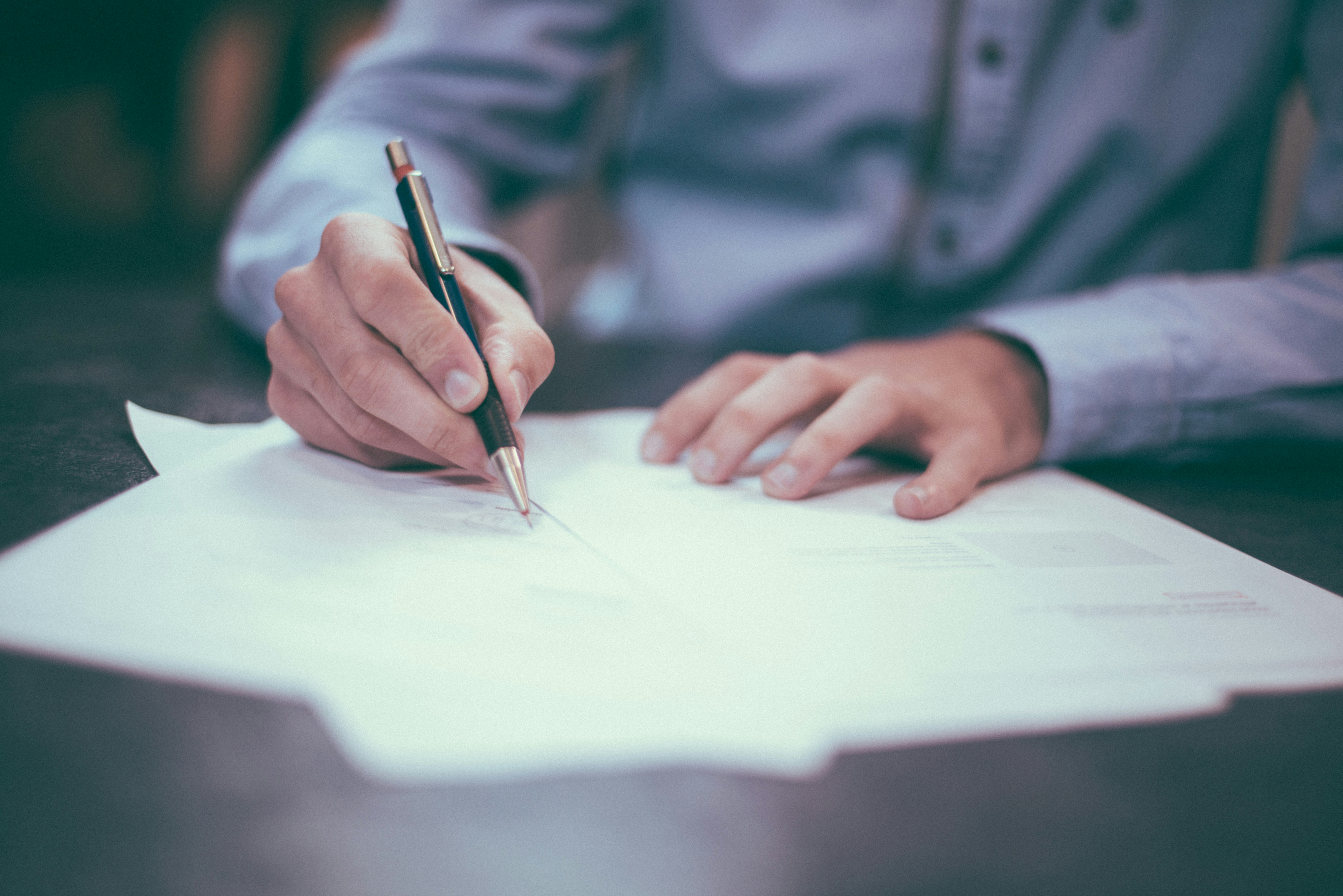 person writing - Email Outreach Best Practices