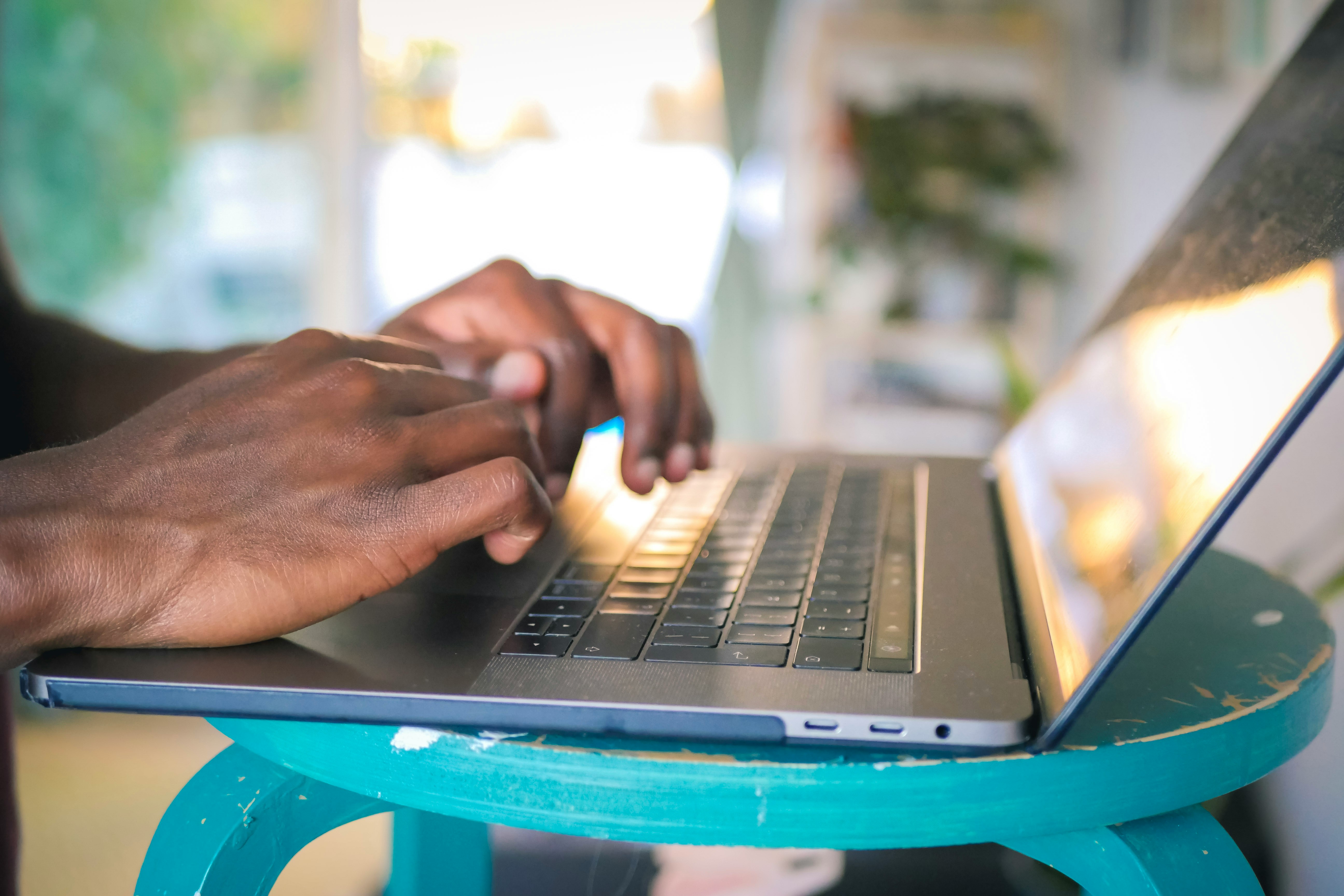 person working on laptop - Fix Email Reputation