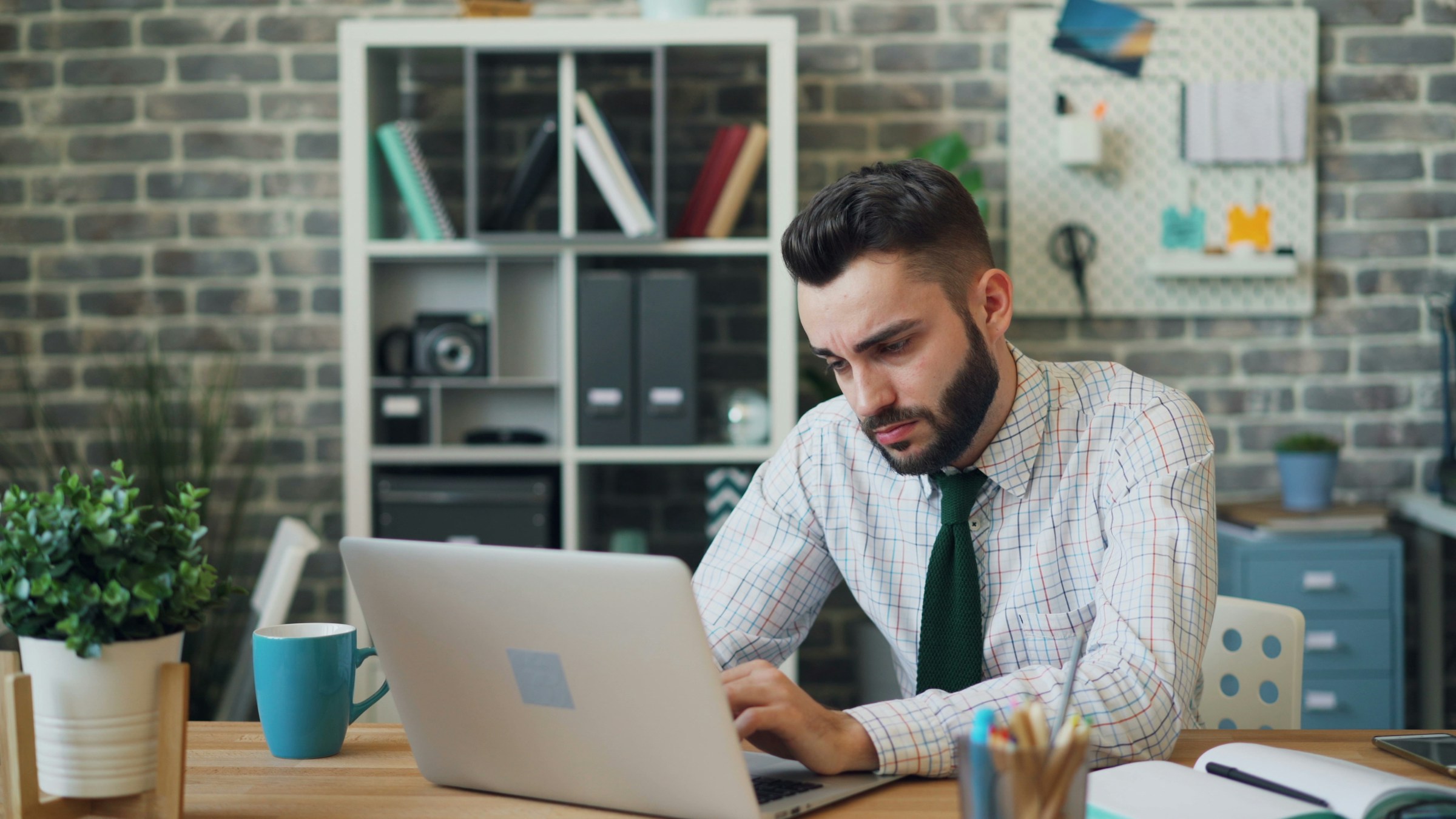man on laptop - Best Time To Send Cold Emails