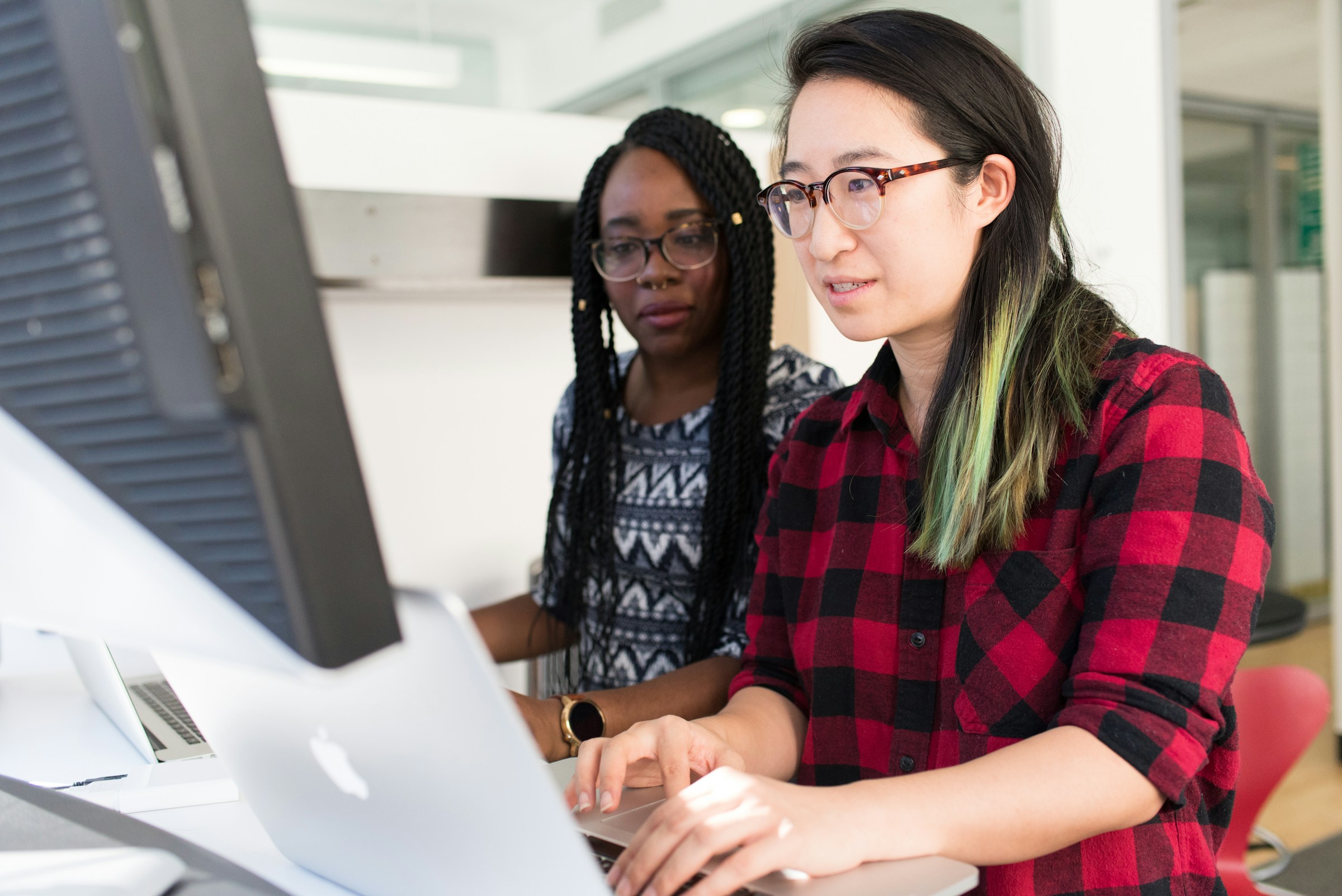 woman checking mails - B2B Cold Email Response Rates