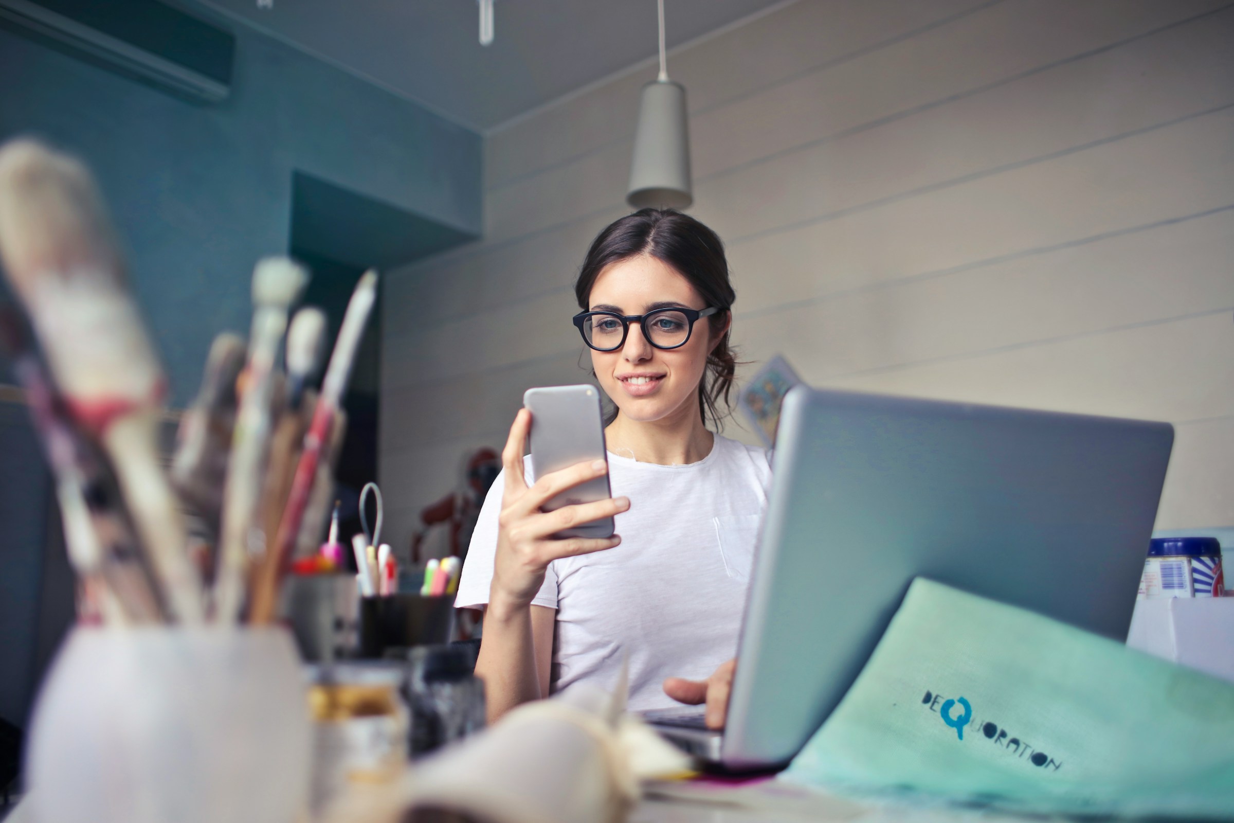 woman reading email - Email Deliverability Rate