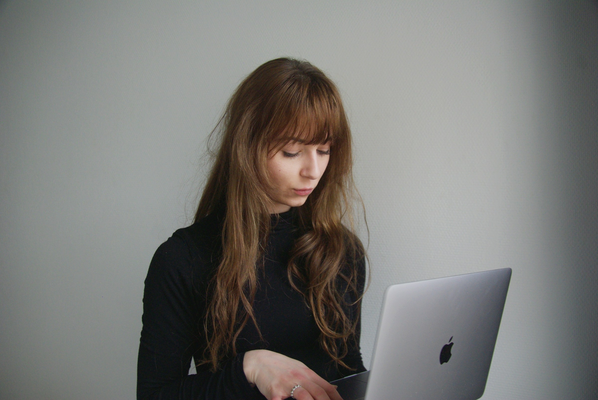 woman looking for tools - How to Improve Email Deliverability