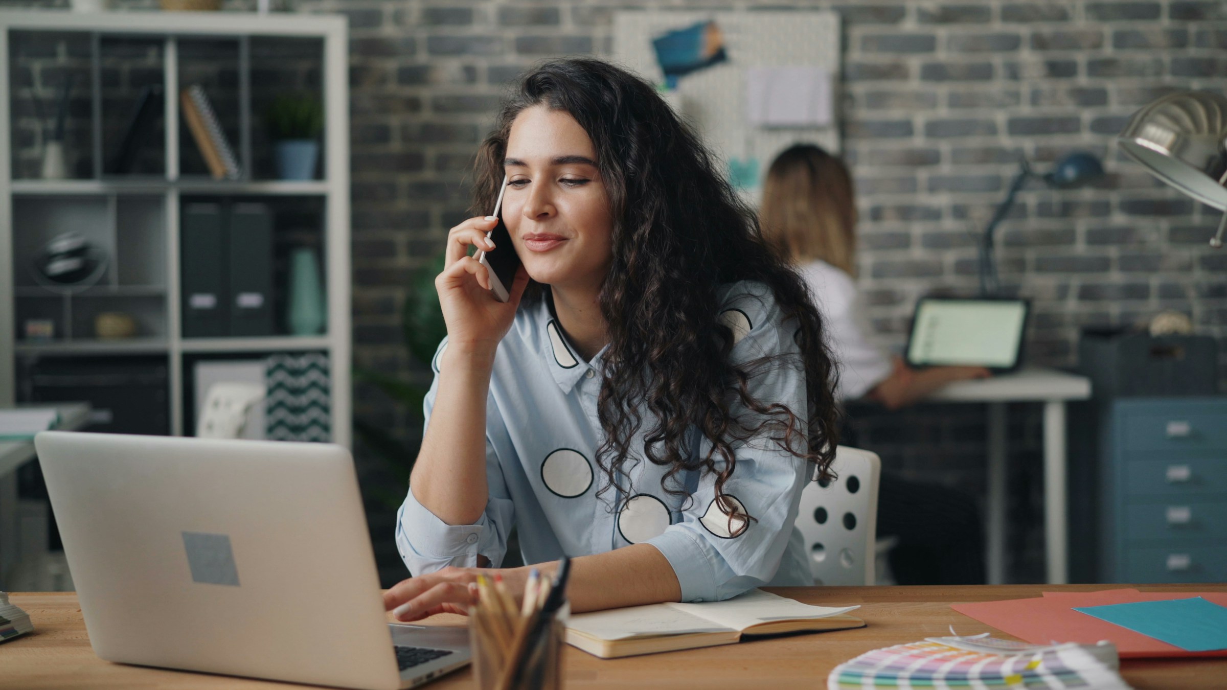 woman on a phone call - How to Improve Email Deliverability