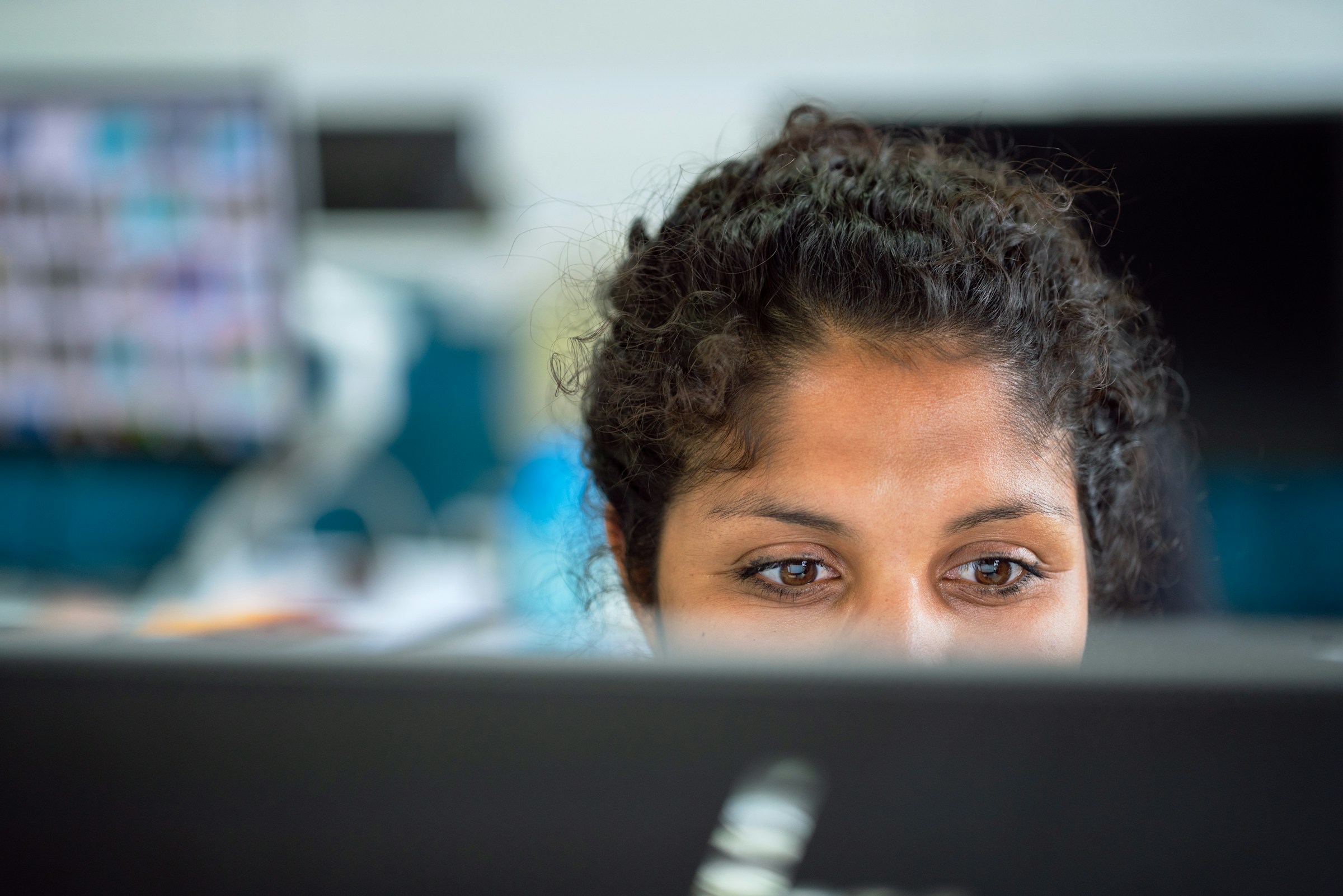 woman checking her mails - Why Are My Emails Going to Spam